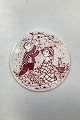 Red monthly plate in faience for October - PARADIS (Paradise). Designed by Bjørn Wiinblad for ...