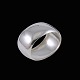 Georg Jensen. 
Hammered 
Sterling Silver 
Napkin Ring 
#29C.
Designed by 
Georg Jensen 
(1866-1935) ...
