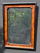 Large mahogany 
mirror, 19th 
century 
Denmark. With 
rosettes in 
corners. With 
dark colored 
...