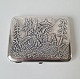Russian 
cigarette case 
in silver 
decorated with 
forest part 
with five bears 
Stamped: Pyotr 
...