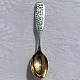 A. Michelsen, 
Christmas 
spoon, 1955, 
Poinsettia, 
Gold-plated 
sterling 
silver, 16cm 
long, Design 
...