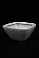 Royal 
Copenhagen 
square 
porcelain bowl 
in green 
Celadon glaze. 
Decoration 
number: 1/2878. 
...