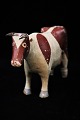Decorative, old 
painted wooden 
cow with a nice 
patina, which 
over time has 
lost a bit of 
its ...