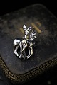 Old brooch in 
silver in the 
form of 2 small 
reindeer cubs. 
3x2cm.