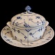 Royal 
Copenhagen, 
Blue fluted 
porcelain;
A lidded 
butter bowl 
with dish #401.
First. H. 10 
cm. ...