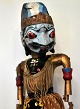 Theater puppet from Indonesia, 19th century. Carved painted wooden head. Movable arm parts. L .: ...