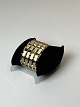 BLOK bracelet in 9 rows and 4 wide in 14 carat goldMeasurements in cm: L: 18.5 W: 4.2 weight ...