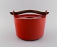 Timo Sarpaneva 
for Rosenlew, 
Finland. Cast 
iron casserole 
in red enamel 
with wooden 
handle. ...