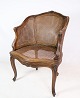 Antique armchair in French cane in walnut from around the 1920s.Measurements in cm: H:87 W:61 ...