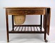 Rosewood side table with wicker basket and drawer of Danish design from around the ...