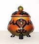 Urn or lid jar 
standing on 
three feet in 
ceramic from 
Peter Ipsen´s 
Enke (Widow) 
from the ...