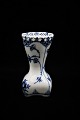 Royal 
Copenhagen Blue 
Fluted Full 
Lace vase. 
Decoration 
number: 1/1162. 
H:10cm.
1.sort. - 1 
...