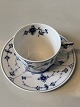 Royal 
Copenhagen Blue 
Fluted #Riflet, 
Mocha cup and 
saucer with 
flower
inside
Dek.nr. # ...