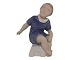 Bing & Grondahl 
figurine, girl 
on stool.
The factory 
mark shows, 
that this was 
produced ...
