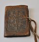 Antique notebook with leather binding, 19th century. Binder decorated with Fleur de Lis. With ...