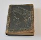 Antique notebook with leather binding, 19th century. Binder decorated with classic woman in ...