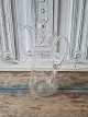 Beautiful old 
glass jug with 
white enamel 
decoration
Height 22.5 
cm.