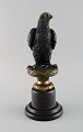 Archibald Thorburn (1860-1935), Scotland. Bird of prey in solid bronze on black marble base. ...