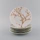 Bjørn Wiinblad 
for Rosenthal. 
Eight "Herbst / 
Autumn" 
porcelain 
plates 
decorated with 
branches ...