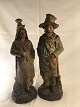 Two Terracotta 
Figures in the 
form of a poor 
man and wife, 
the last half 
of the 19th 
century. ...