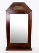 Antique mirror in mahogany wood from around the 1890s.H:67 W:36 D:10
