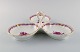 Herend Chinese 
Bouquet 
Raspberry. 
Three-part 
serving dish 
with handle in 
hand-painted 
porcelain. ...