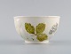Davenport, 
England. Bowl 
in 
cream-colored 
porcelain with 
flowers and 
foliage in 
relief. Early 
...