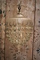 Old Swedish prism lamp with lots of fine clear glass prisms. Has a light source in the middle. ...