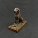 Height 17 cm.
Length 18.5 
cm.
Very detailed 
wooden figure 
of dog sitting 
with bowl with 
legs ...