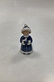 Royal 
Copenhagen Mini 
Collection Girl 
with Bird No. 
741. Measures 
7.3 cm / 2 7/8 
inches. With 
...