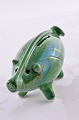 Piggy bank in green colored glaze. From Gouda Netherland. Ceramic pig, length 19 cm. height 8 ...