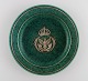 Wilhelm Kåge (1889-1960) for Gustavsberg. Argenta art deco dish in glazed 
ceramics. Beautiful glaze in shades of green with silver inlay in the shape of 
an eagle and a royal crown. Mid-20th century.
