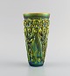 Zsolnay vase in 
glazed ceramics 
modelled with 
women picking 
grapes. 
Beautiful 
luster glaze. 
...
