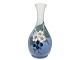 Royal 
Copenhagen vase 
with flowers.
The factory 
mark tells, 
that this was 
produced 
between ...