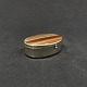 Length 5 cm.
Height 1.6 cm.
Large oval 
pill box with 
patinated sides 
ind shiny metal 
and red ...