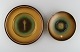 Zicu, Sweden. Two art deco dishes / bowls in patinated metal. Woman and face in relief. Mid 20th ...