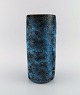 Pieter Groeneveldt (1889-1982), Dutch ceramist. Cylindrical unique vase in 
glazed stoneware. Beautiful glaze in blue and dark shades. Mid 20th century.
