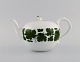 Meissen Green 
Ivy Vine teapot 
in hand-painted 
porcelain. Lid 
modeled with 
rose bud. ...