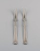 Hans Hansen 
silverware no. 
7. Two art deco 
cold meat forks 
in silver 
(830). Dated 
1936.
Length: ...