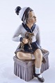Dahl Jensen porcelain figurine, Gril with christmas goat no. 1158. height  21 cm. 8 1/4 inches. ...