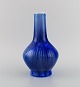 Paul 
Proschowsky 
(1893-1968) for 
Royal 
Copenhagen. 
Unique 
porcelain vase. 
Beautiful 
crystal ...