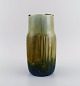 Valdemar 
Engelhardt 
(1860-1915) for 
Royal 
Copenhagen. 
Unique 
porcelain vase. 
Beautiful 
crystal ...