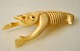 Greenlandic tupilak, 20th century In the form of crawling animal. Carved from narwhal tooth. L.: ...