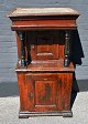 Danish baroque cabinet, 18th/19th century. Brown-painted pine wood. Originally red/blue painted. ...