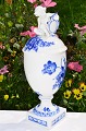 Royal 
Copenhagen 
porcelain, Blue 
flower curved. 
Beautiful vase 
with putti on 
corver no. 
1754. ...