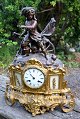 French zinc clock, 19th century. Top decoration in the form of a warlord. Upper part bronzed - ...