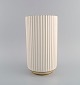 Early Lyngby porcelain vase with gold decoration. Dated 1936-1940.Measures: 25.5 x 14.5 ...