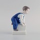 Claire Weiss 
for Bing & 
Grøndahl. 
Porcelain 
figure. Boy. 
1970s. Model 
number 2399.
Measures: 13 
...