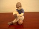Bing & Grøndahl 
has produced 
this cute 
figurine of a 
boy and his 
football. 
Decoration 
number ...