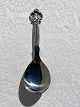 Grape clusters 
serving spoon 
in 
three-towered 
silver (830S) 
from Cohr 
silver goods 
...